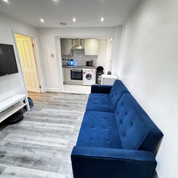 Whitehall Lane one-bedroom apartment photo 10: living room and kitchen area.